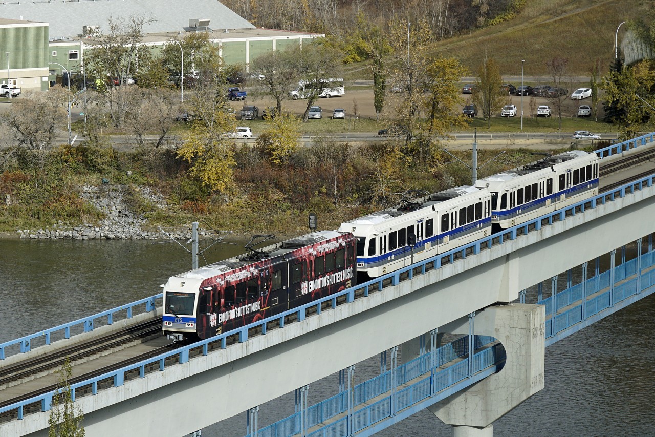 AN Edmonton Transit 3 car unit crosses the North Saskatchewan River alongside the 109th Street bridge.  Theses Siemens-Duewag U2 type vehicles were originally designed for the Frankfurt U_Bahn.  They are now used by Edmonton, Calgary and San Diego LRT systems.