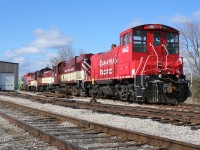 During spring 2008, Canadian Pacific sent several of their MP15AC’s and MP15DC’s to have modifications performed at Ontario Southland Railway’s (OSR) Salford, Ontario shop. These upgrades were performed by ZTR, which is a supplier and installer, if required, of parts for locomotive enhancement.  At the time, ZTR was contracted by Canadian Pacific to equip units 1440–1447 with the Smart-Start system and also a form of adhesion enhancing equipment. The work was performed in the Salford facility by ZTR with testing following by OSR on their trains at the time. Canadian Pacific interchanged the units with OSR at Woodstock. 

MP15DC 1442 is seen along with several other OSR units outside the Salford shop on a sunny spring afternoon shortly after arriving from Canadian Pacific.
