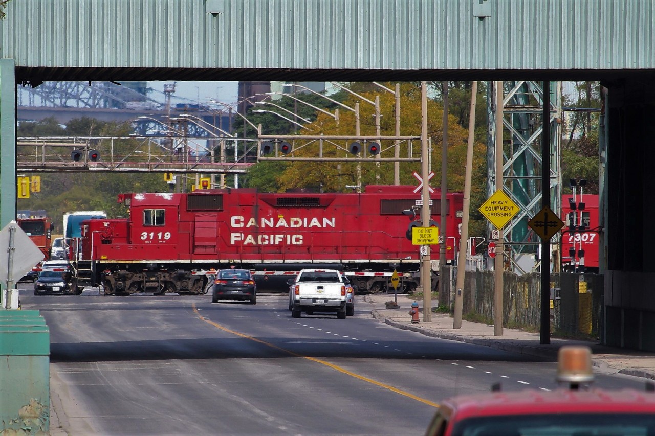 "Heavy Equipment Crossing" on Ottawa Street North in Hamilton. I was actually heading to catch them at Main and Gage when I saw them in my rearview mirror and it reminded me of Steve's shot with the Dofasco sign in it. Of course, that sign is gone now and the structure has changed, but it is still a neat sight to see them working the yard like this. So I pulled over near the Grimsby Sub and snapped a shot before heading along.