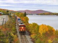 CN train 306 is eastbound, as they head through the scenic Lac Baker, shortly after crossing over from Quebec into New Brunswick. This area of New Brunswick looks great all year, especially in the Fall. 