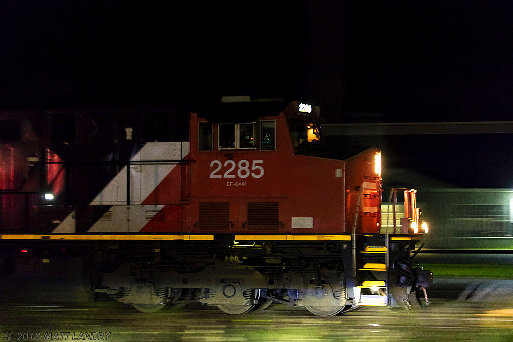 A bit of night time panning, CN 2285 leads train Q120 at Amherst, Nova Scotia.