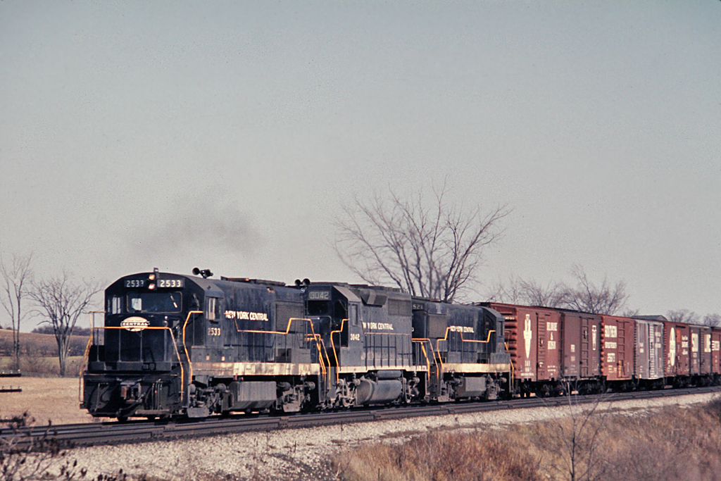 It is April 1968 and the NYC was still quite active on the CASO Sub.  U25B 2533, GP40 3042 and U25B 2521 are in New York Central paint seen here westbound at Clanbrassil.