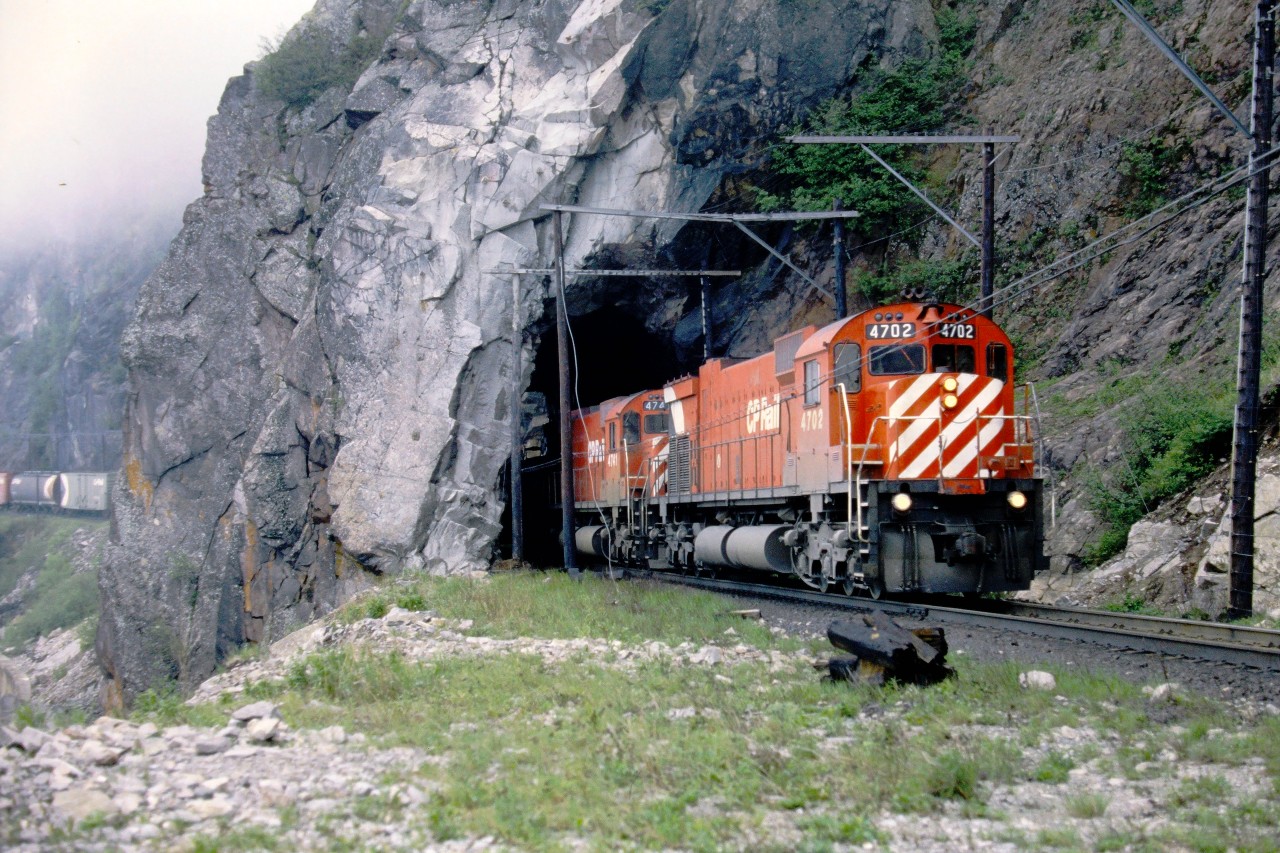 CP east bound freight exiting Mink Tunnel, mile 72.9 Heron Bay Subdivision.