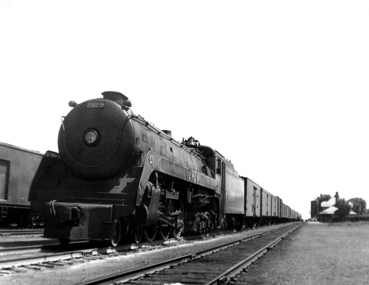 Royal Hudson 2829 on train 5, the mail and Express, which ran as a section of the "Dominion" pauses at Virden before entering single track.