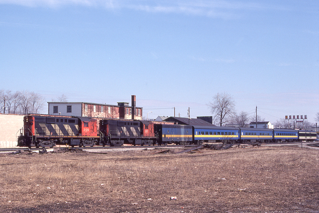 CN 3129 and 3117 lead a VIA train through London, Ontario on March 24, 1981.
Bob