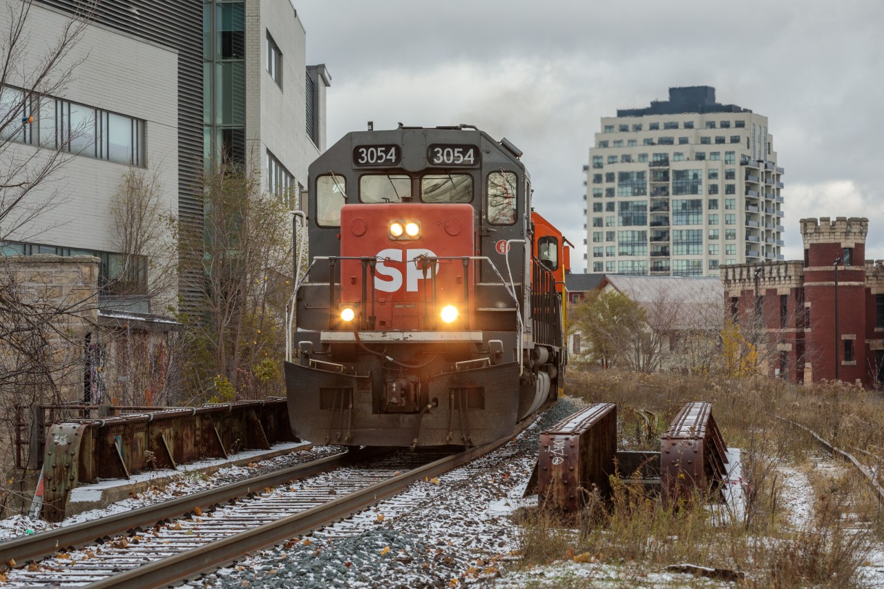 A hint of Southern Pacific in the Royal City. With less than a week until the CN takeover, GEXR train no. 431 rumbles through downtown Guelph with an ex-Cotton Belt tunnel motor doing the honours. The recently applied 'after market' nose decal was a welcomed addition!