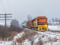 On the afternoon following the region's first major snowstorm, and CN's takeover of the GEXR, Quebec & Gatineau 2008 lugs CN train no. 432 through the countryside at Mosborough, ON. A shot of redemption for those trackside after GEXR's rather unceremonious departure from Southern Ontario the day prior. Although these locomotives don't read "GEXR", their character is everything railfans came to love the railroad for. Nothing like old-school EMDs hauling heavy duty tonnage at speed. Perhaps things didn't end the way people had expected them to, but as far as I'm concerned, this send off was good enough for me.