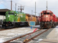 Freshly painted ex SOO/CP SD40-2 Prairie Line #3001 is coincidentally parked beside another former hump SD of the same series CP 6621. Note the hump control connector still under the crossover platform of the 3001.