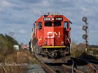 CN 5409 with GECX 7325 and CN 3047 shove train 394 back into the yard at Sarnia.
