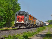 The final ten days are upon the GEXR, but back in May that was still a ways off.  431 in it's final days is using the same SD-trio pictured here, a far cry from the green and cream Shakespearean GP9's from the Cartier Railway.  The units wore Shakespearean names for "The Festival City," Stratford: Home of the Stratford [Shakespearean] Festival.<br>177 named 'Titania' from <i>A Midsummer Night's Dream</i><br>178 named 'Paulina' from <i>The Winter's Tale</i><br>179 named 'Portia' from <i>Julius Caesar</i> and <i>The Merchant of Venice</i><br>180 named 'Falstaff' [Sir John] from <i>Henry IV; parts I & II</i> and <i>The Merry Wives of Windsor</i><br><br>Today's railway, now gone through 3 owners (Railtex to RailAmerica to today's Genesee & Wyoming) is quite different, geeps have come and gone, now big SD's ply the line, including Canada's only SD45T-2, and in 10 days  the line returns full circle to it's original state, orange power being one of the only differences.  All the best the crews of the GEXR!