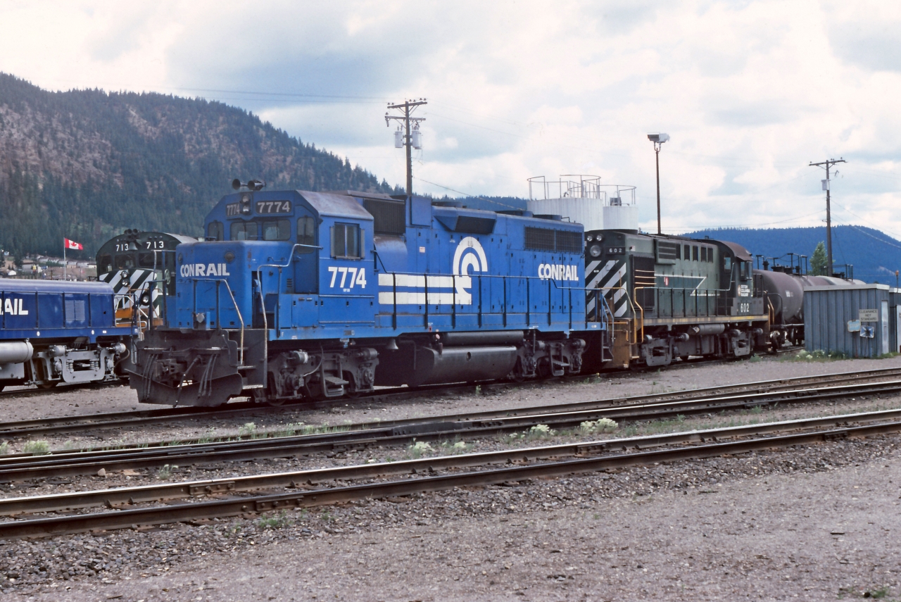 Some CR Blue & White, some BCR two tone green as well as silver and blue. Conrail 7774 far away from home working as yard engine in William Lake BC. BC Rail was short of power and scrounged up a few Conrail units. The story I heard was that the CR units had been leased to CP Rail and then rented out to BC Rail. The units were in rough shape mechanically and spent most of their time dead and awaiting repairs, needless to say BC rail did not keep them long. Sorry I can't pin down a date for this image, most likely mid-1986, the cheap slide film that day did not process with a date stamp.