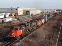 While the lash up wasn’t the most impressive, it’s always nice catching dimensional loads near the head end, not to mention a GO coach on the tail end. The late day lighting doesn’t hurt either :) Here we see train 422 slowing for a meet with local 551, once the dimentionals clear the passing train the eastbound will notch up to attack the Halton Hills.