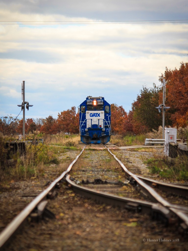 Without realizing what I had just done, I took my farewell shot of the CN Sarnia Spur. We had chased L514 throughout the morning, from Chatham to Thamesville and back, upon arriving back in Chatham L514 cut off their cars from Thamesville at the North end of the former C&O yard, then ran light power to Thompson’s in Blenheim to pull the final cars back to Chatham, closing an era. It wasn’t until talking to a fellow CN conductor that was working the job, that I was told that this may be the final time CN travels the Sarnia Spur. Thompson’s is now transporting their grain via truck to CP in Kent Bridge and no longer want to be serviced by CN. As a Chatham kid born and raised, this job has always had a special place in my heart and was always a favourite to chase. I feel very grateful to have my photos and memories of the line and the privileged to have traveled over it many times. Let’s hope this isn’t the end.