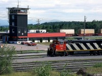 CN C40-8M 2429 is pictured passing by the yard tower at Joffre Yard on July 11th 1991. At the time cowl-bodied GE C40-8M's 2400-2429 were a little over a year old, making 2429 was the newest unit in the fleet (built March 1990). A second order for more GE's would follow in 1992.