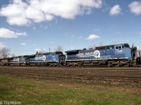 Another view of a detouring CN train (<a href=http://www.railpictures.ca/?attachment_id=35475><b>pictured before here</b></a>) on CP at Smiths Falls, pulling ahead and showing off the trailing Conrail C40-8W units 748, 752 and 747 behind CN 5335.
<br><br>
The three blue units were part of 60 C40-8W units purchased by Conrail for leasing service with LMS (GE), with many on a shared lease between CR and CN. Unlike some of the units painted blue but lettered LMS, these later units were numbered and painted in the CR livery. When the Conrail split happened, the leasers were divided up between CN, CSX, and NS.