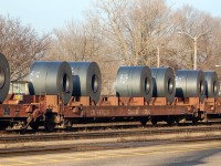 SOR 598 arrives at Brantford from Nanticoke to do their runaround move, and proceed back to Hamilton. CN 667035 is loaded with the standard 4 steel coils. Power was CN 7076 - CN 4121