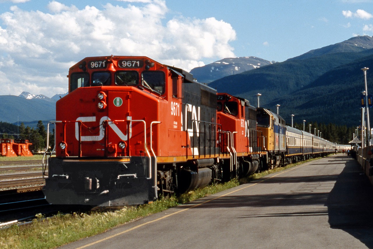 A Fallen flag in terms of the train.  The American Orient Express is no more.  Seen here in Jasper in July 2002, some 6 years before its final demise.  The GP40's are still around and can be seen on CN duties, but not looking as clean and shined up these days.  VIA 6438 is of course still active in the fleet although now in it's -3 rebuild configuration.