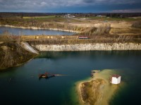 GEXR 582 rocks down the rickety Fergus Spur, passing by the old Dolime Quarry in Guelph, ON.