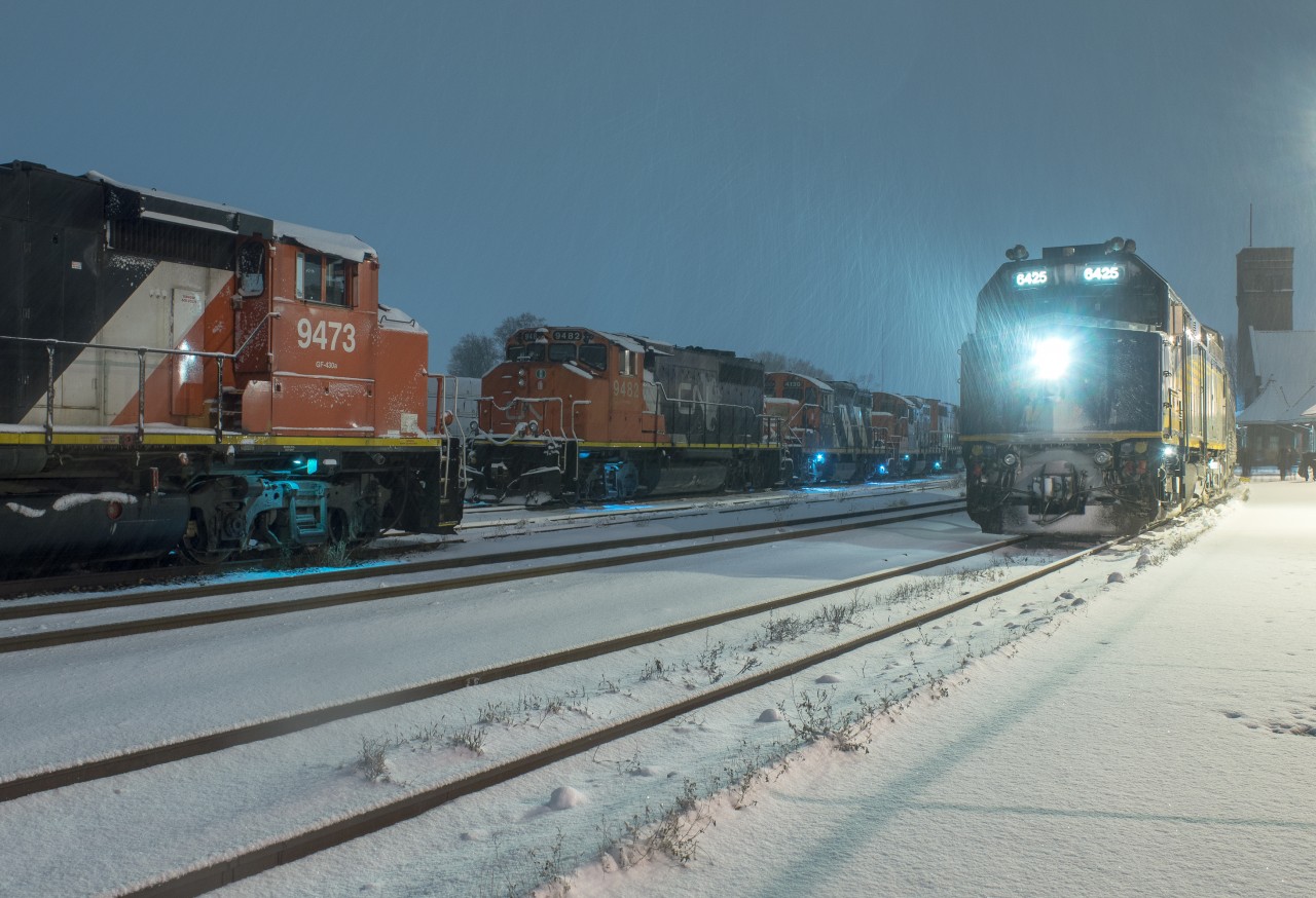 The first real taste of winter weather happened tonight, shutting down highways and making for long commutes for drivers.  After a 2 hour commute home tonight, I didn't think I'd be out photographing trains, but a text from a buddy got me thinking of a unique photo opportunity and this is what I came up with.