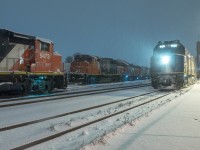 The first real taste of winter weather happened tonight, shutting down highways and making for long commutes for drivers.  After a 2 hour commute home tonight, I didn't think I'd be out photographing trains, but a text from a buddy got me thinking of a unique photo opportunity and this is what I came up with.