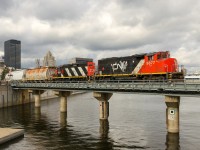 A short transfer is exiting the Port of Montreal with CN 9677 & CN 4115 for power.