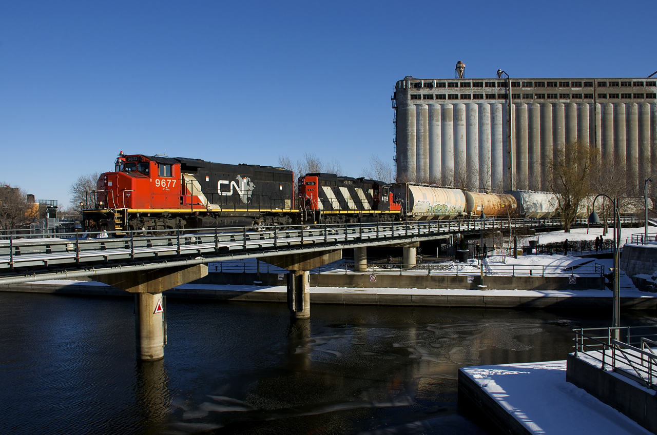 CN 9677 & CN 4115 are doing some switching in front of grain elevator #5 on a cold afternoon.