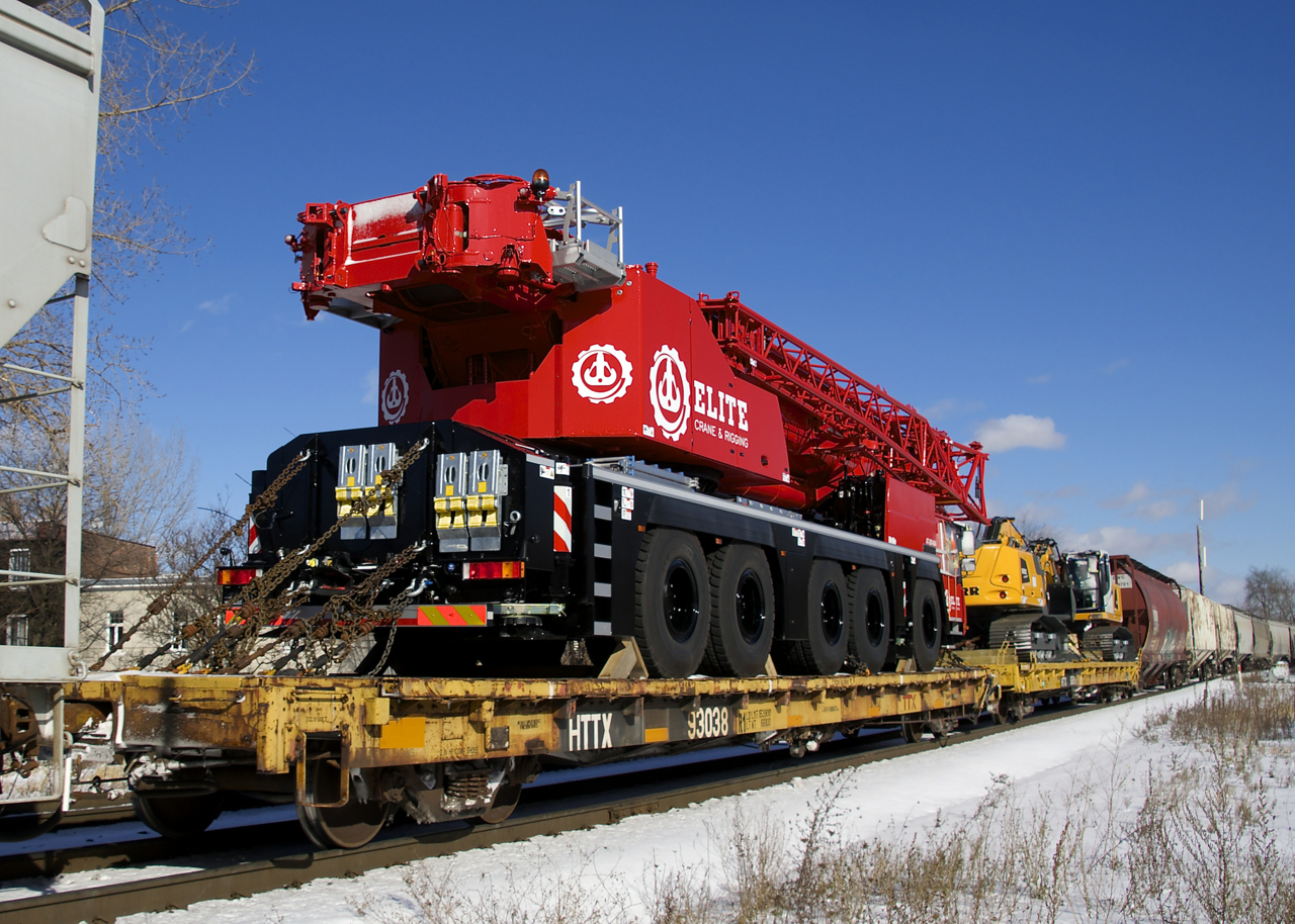 A few loads of Liebeherr construction equipment heading west on CN 305.
