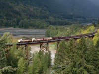 CP 1401 West crosses over the Anderson Creek bridge on the CN Yale Subdivision. In this portion of the Fraser River canyon, all westbound trains use CN tracks, and all eastbound trains use CP tracks. 