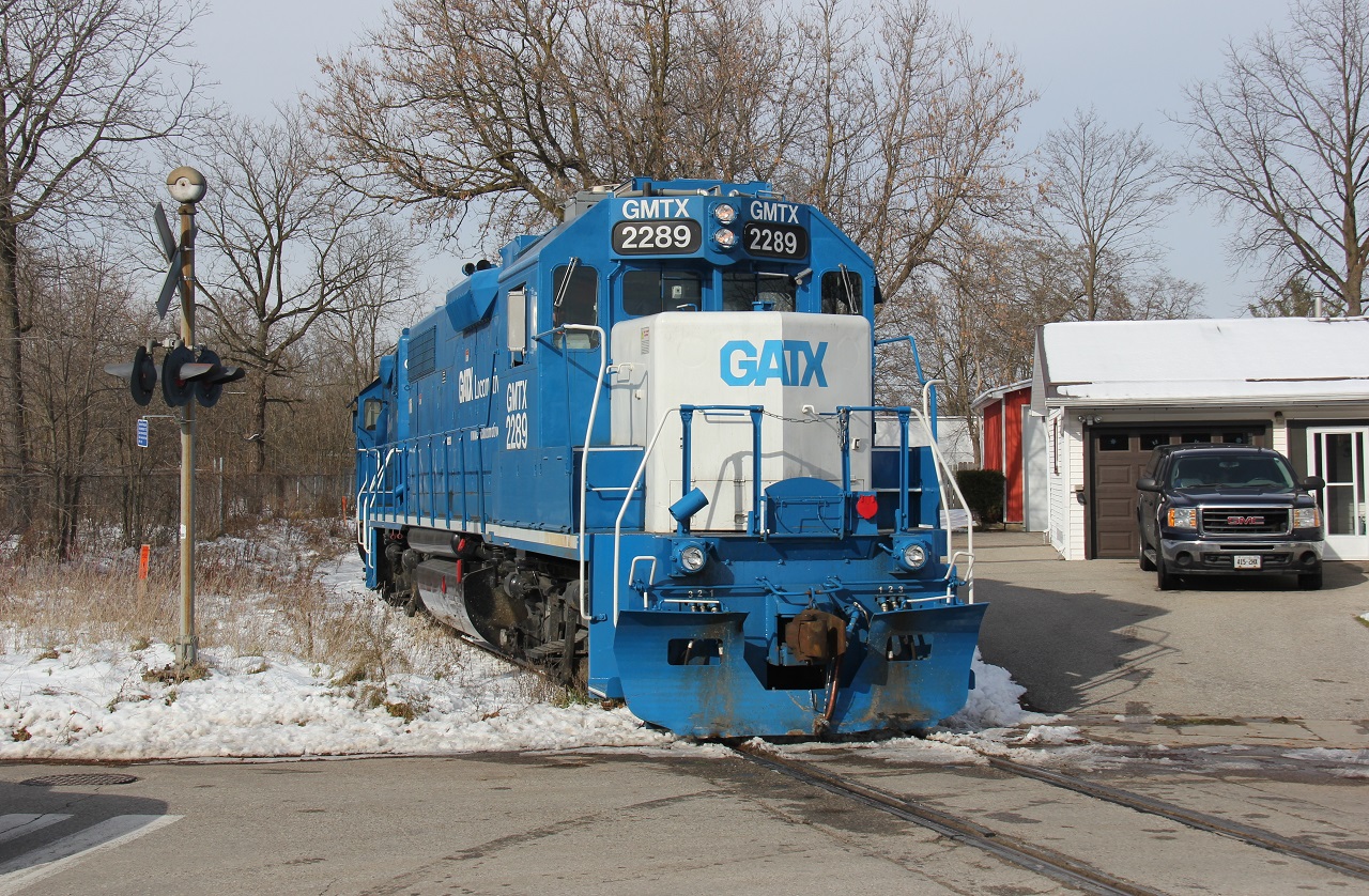 GMTX 2289 and GMTX 2274 in charge of CN L540 (formerly GEXR 580) shove back with one car to wye their train. They are pictured at Crimea Street at CN Guelph Jct.