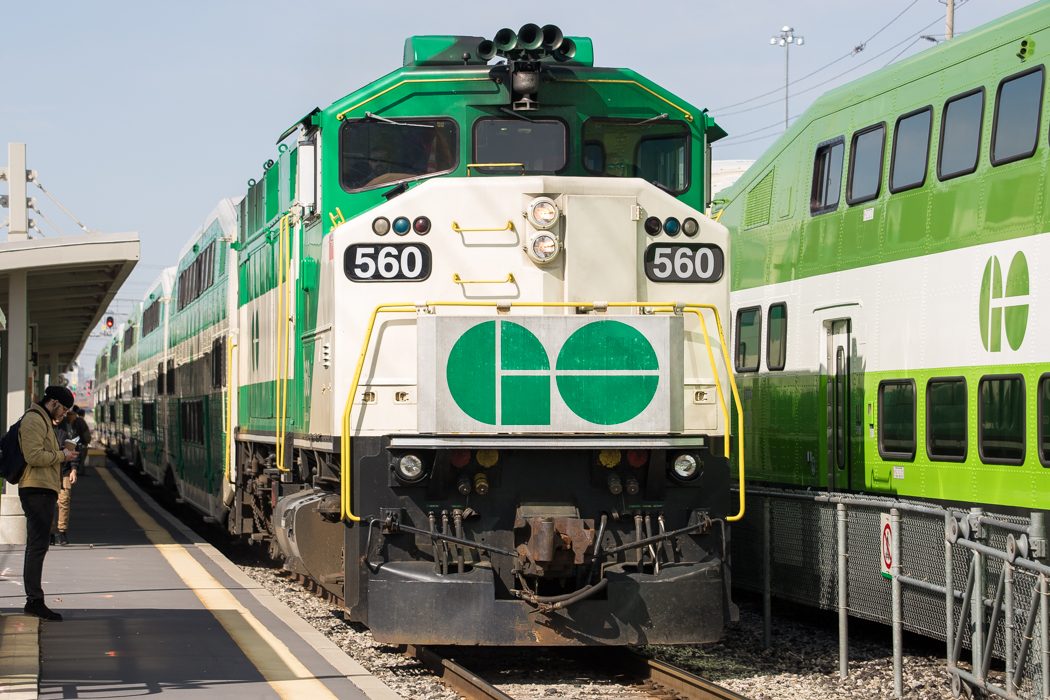 A GO Transit EMD F59PH is seen arriving at Malton GO, heading Eastbound towards Toronto Union Station, on a warm April morning.