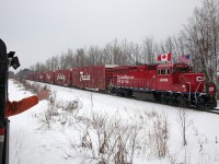 CP's Holiday Train needs no introduction.  It's become a "must see " event and does so much good for food banks right across the country.
Just prior to it's next stop at Midhurst, just outside of Barrie Ontario, the crews of the Cando Rail Services local and CP's Holiday Train exchange waves in the true spirit of the season and railroading.  