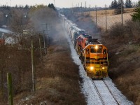 It was a frigid morning with a light dusting of snow, in what is likely going to be my only time shooting 432. Here, 3394, 3403, and 3054 are about to pass under Jones Baseline as they continue the eastward march on the Guelph Sub.
