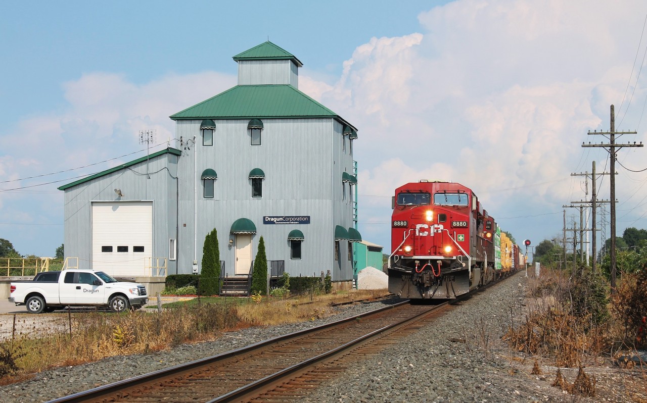 CP 235 rockets past the old mill/elevator in Elmstead, Ontario. The building was repurposed a few years ago and is now used as office space. For a comparison, please check out Geoff Elliott's shot of the Expressway here in 2000. http://www.railpictures.ca/?attachment_id=33837