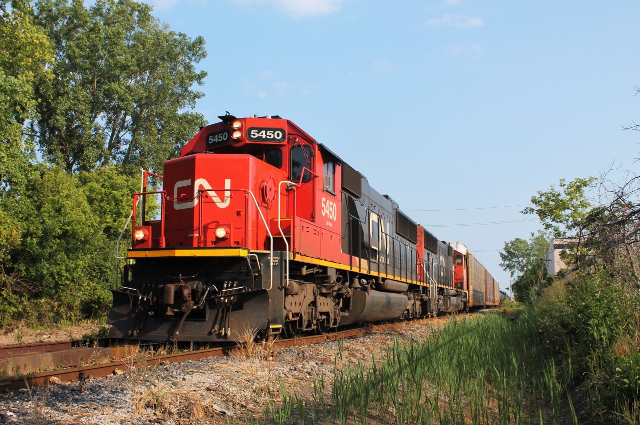 CN A438 eases its way along the Chrysler Spur towards the Chatham Subdivision in Windsor. Ironically, this spur used to service the Ford Essex Engine Plant before they cancelled rail service several years ago.