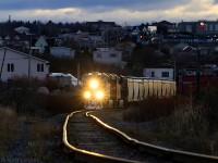 After setting off the first half of their train, CN B730 has returned to their second half, still at CN's Island Yard, in Saint John. They are seen here rounding Cains Corner, "the rock cut", heading to Courtnay Bay. Some great track along this spot, but it could be over emphasized by the 250mm lens. 