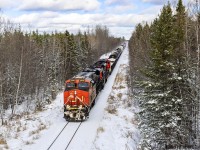After a fresh snowfall, CN 2338 is westbound, as they approach Petitcodiac, New Brunswick. 