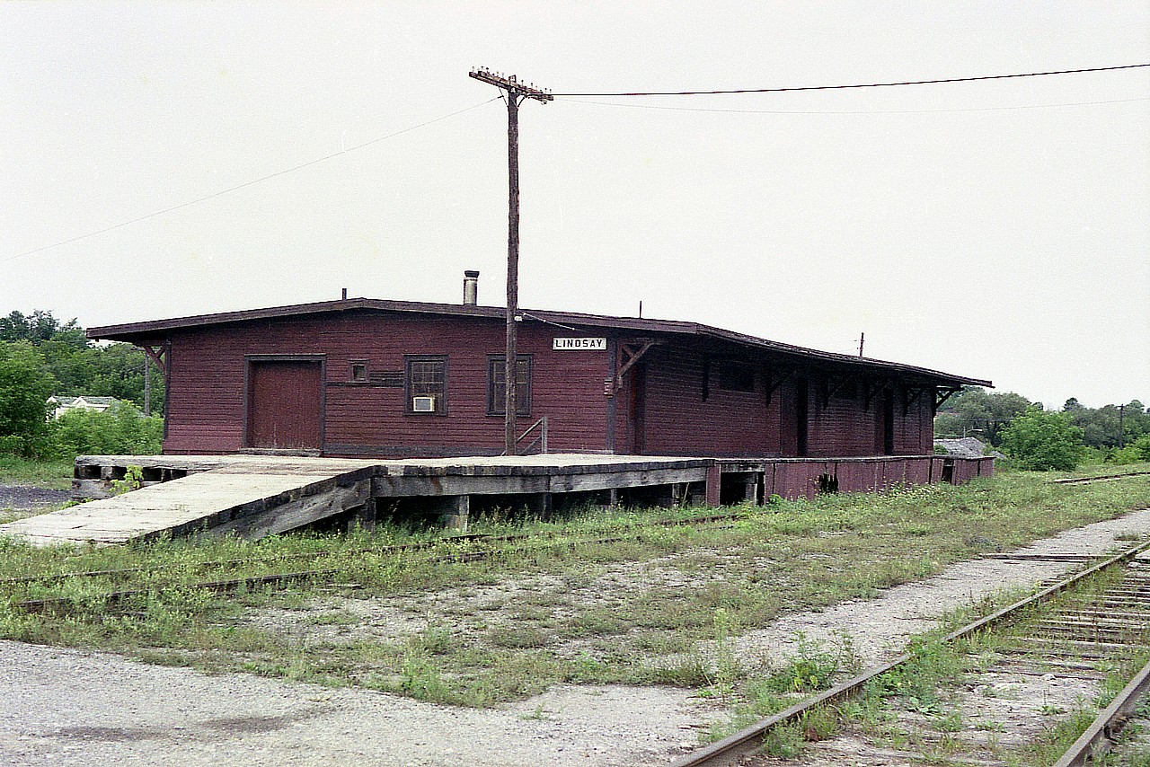 It seems odd that one of the cities most influenced by the railroads would shed its affiliation with them before most other communities. There were once 7 railroads radiating out of Lindsay. There were 5 stations, built on 4 different locations. Yet the last station was dismantled in 1963 and the last tracks were pulled up around 1992. All I could find in a visit back in 1977 was this CPR Freight Shed. I understand it was still in use in various capacity up until in the 2000s.  It is now gone, and save for a few static displays and rail trails, everything else railroad is now history there as well. The sign board on this shed I understand to be salvaged from a CP station that once stood on this very spot.
