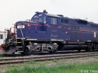 OLOR GP9 179 "Griffin" is shown with sister unit 180 "Champlain" at Vankleek Hill on May 22nd, 2000. OLOR is the Ontario L'Orignal Railway that was operated by RailTex/RailAmerica, and L'Orignal (note the spelling, not L'Original) is on the Ottawa River 88kms east of Ottawa. The line was acquired by Quebec Railway Corp in 2000.
<br><br>
Both 179 and 180 were ex-Cartier GP9's that came to OLOR via the GEXR in the 1990's, and later made their way to the Michigan Shore Railway (where both ran until eventually being sold for scrap).