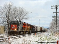 Well, the last week of GEXR's Guelph sub has certainly been interesting.  On Monday 431 was generally on-time but a broken rail around Mile 39 caused a 1 hour delay, and the Trainmaster made the call to park 431 at Kitchener and 580 would return light power bringing no cars. Usually GEXR would call over a rescue (night Stratford job) to switch out Kitchener cars and take the balance of the train to Stratford but that did not happen, it sat in Kitchener all night. So on Tueday 432 picked up where 431 left off and in the morning, switched the yard before departing west at around 1030. After arriving at Stratford, and after VIA 85 passed, the same crew departed east and ran to P&H Shantz Station elevator (around mile 56) to make a setoff of grain hoppers, and then returned back to Stratford light power in the mid afternoon. They did not run to Toronto.<br><br> Sundays 432 also did not run to Toronto, instead running to the CP Interchange at South Jct in Kitchener with a pair of four axle units (photos to come later - I chased the bejeebuz out of this) and returning to Stratford with some RCPE loads<br><br>Today's train ran normally, until they departed mac at 1515, with ZERO time to spare on the clock (any delay would cause a serious problem - normally GEXR has to park at mac if they don't depart by 1430)... well.. 435 pulled a drawbar at Georgetown blocking their access to the Guelph sub so yeah, game over, and as I type this at 2100.. 431 is still sitting at Peel.<br><br>It's any guess if tomorrow's final run will be a one way trip to Stratford with 432 taking a taxi to peel or if they find a crew to move it tonight.. and run a regular round trip tomorrow. Because at Midnight Friday, it's over folks and it'll be CN moving traffic after that..<br><br>For photographers, the unusual is a silver lining, and  the snow fell overnight into Tuesday and it was beautiful, serene, and still windless. Everything was white and just unique looking. I had to get SOMETHING, and I was expecting to get 432 in G&W Orange at around 0800. I've seen this before and usually by 0800-0900 any snow like this would blow off as the wind picks up and this serene, pretty scene is all gone making shots like this quite difficult to pull off. Thanks to a tip by rp.ca member Kevin Flood, 432 was switching Kitchener yard facing west with the ex SP leading with this pretty, windless scene intact, the sun trying to come out (adding a bit of colour) and only because operations aren't normal on GEXR was this even possible. A silver lining for sure.. thank you GEXR.