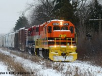 Celebrating GEXR's Guelph subdivision and spurs: There was once a double ended siding here but I can't figure out for the life of me if it was ever called anything - between Guelph Jct and Marden (and Fergus) on the CNR Fergus subdivision would be where this siding is and other than use as a team track, I don't know what other purpose it served. What's neat is the grade coming over the hump at Willow Rd and you need a long enough train to really show it off. I like how G&W orange really stands out on a dreary, cold day, it's almost a completely monochrome scene other than the locomotive.

