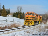 The former CN Fergus sub between Guelph and Galt has a few spots of notable scenery, otherwise, it's largely grown in and inaccessible if only by drone in parts (See Ryan's <a href=http://www.railpictures.ca/?attachment_id=35419 target=_blank>great effort at Glenchristie</a> but this spot is fairly open, on a private driveway serving two homes. I certainly enjoyed when the flared radiator 3806 was assigned to this job and of course preferred it leading to it's slug 806.