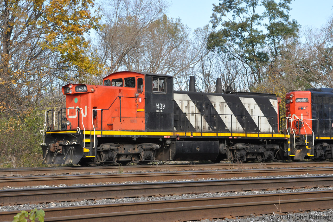 On the occasions when I've seen a GMD1, it has usually been in between other units. It was great to catch CN 1439 in the lead in 2018 on a nice autumn day in southern Ontario, and that the 5 locomotive set switching Aldershot Yard needed to pull cars this far west. 
Nearest are Oakville Sub main tracks 3, 2, and 1. CN 1439 is on the farther of 2 yard tracks, reducing to one ahead at Grindstone Creek.