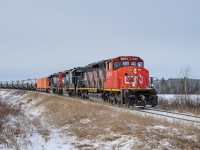 Fort McMurray bound CN train L557 is back on the move again after making a setout for On-Track at Daugh.
