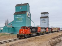 CN SD40-2Ws 5325, 5279 and 5321 charge into the Rule 105 territory at St. Albert with 57 cars for Walker Yard.