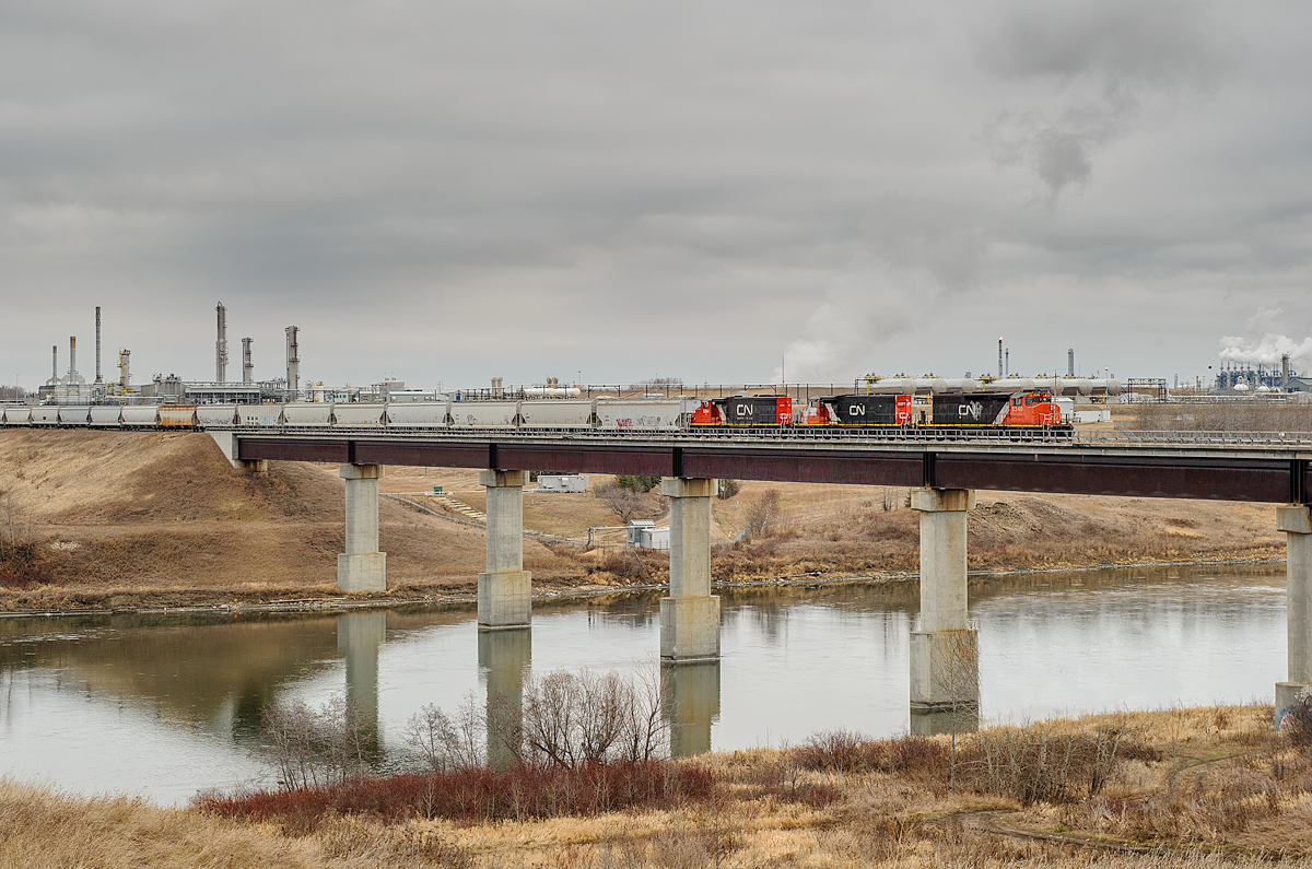 CN SD40-2Ws 5349, 5277 and 5264 lead 104 loaded plastic/chemical cars across the North Saskatchewan River enroute to CN's Walker Yard in Edmonton.