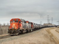 If you like CN SD40-2s, the Scotford area is for you. One of at least 4 sets of SD40-2s around on this day climbs up the Beamer Spur with 62 empty tanks in tow.