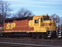 All the excitement over the "SP" on the GEXR made me think of another time some SP were in Southern Ontario.  Long before the days of e-mail, discussion groups and texting, imagine our surprise when 392 rounded the curve at Hamilton West with CN 9666, CN 9409, GTW 5929 and SP GP35s 6677, 6639, 6577 and 6556 in a cloudy of brake shoe smoke.  we hightailed it to King Road in Aldershot for another look.  For rebuild fodder the GP35s were in surprisingly good shape.  Of particular interest was 6577 in the red and yellow "kodachrome" scheme for the failed SPSF merger.  SPSF, meant to be the merger of Southern Pacific and Santa Fe; the acronym became "shouldn't paint so fast" after the ICC did not approve the merger.  Just as well, it would have been the Penn Central of the west.  It appears as though not all of these GP35s were rebuild, however SP 6577 was rebuilt at AMF in Montreal and lives on today as New Brunswick Southern (NBSR) 9803.  Thanks Dad for driving us all over creation to see this stuff! 