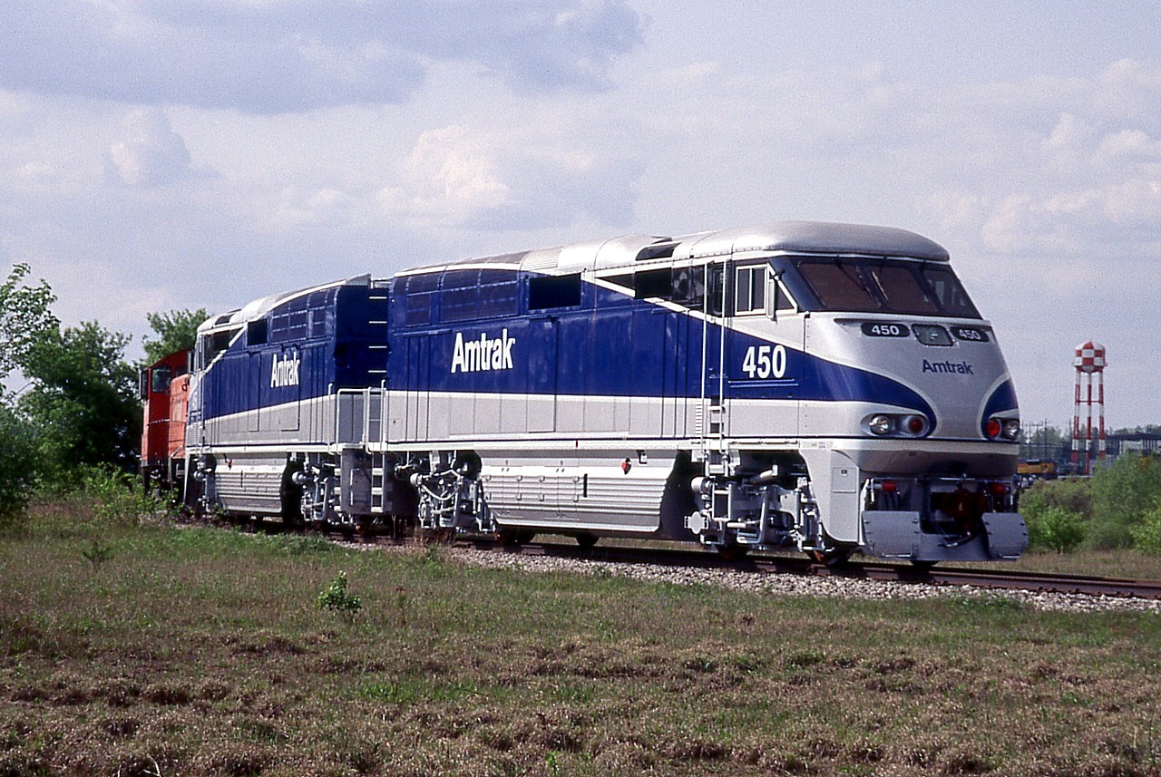 Amtrak is currently returning F59PHIs 450-470 to Progress Rail.  The units have subsequently been sold to Chicago commuter railroad METRA.  My first reaction upon reading this was they're not that old are they?  It's hard to believe they're 20 years old.  On May 9, 1998, we happened to be in London to photograph the Apache ex. CP C424s heading west and lucked out also catching CP 1270 picking up AMTK 450 and 451 from the EMD plant.  These were the only two built in London; the remainder of the order was built at Super Steel Schenectady.
