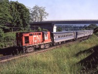 Eastbound CN 3153 is east of Bayview Junction, Ontario as it heads to Toronto on June 17, 1980.
