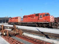 A pair of stored SD40-2's at the west end of plant #2. The wheels in the foreground are for rail cars. 